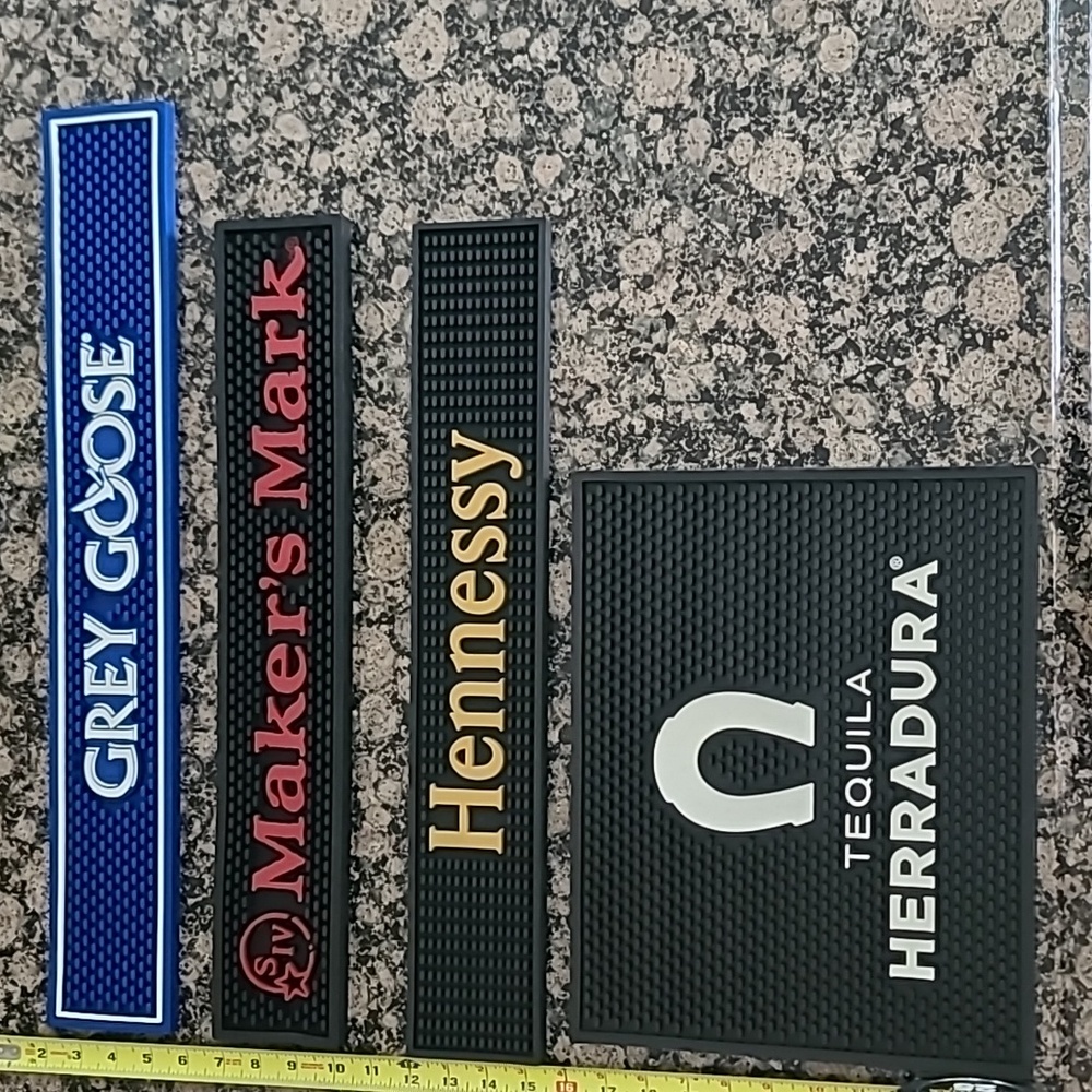 QtY:4 Bar spill mats all sold together.